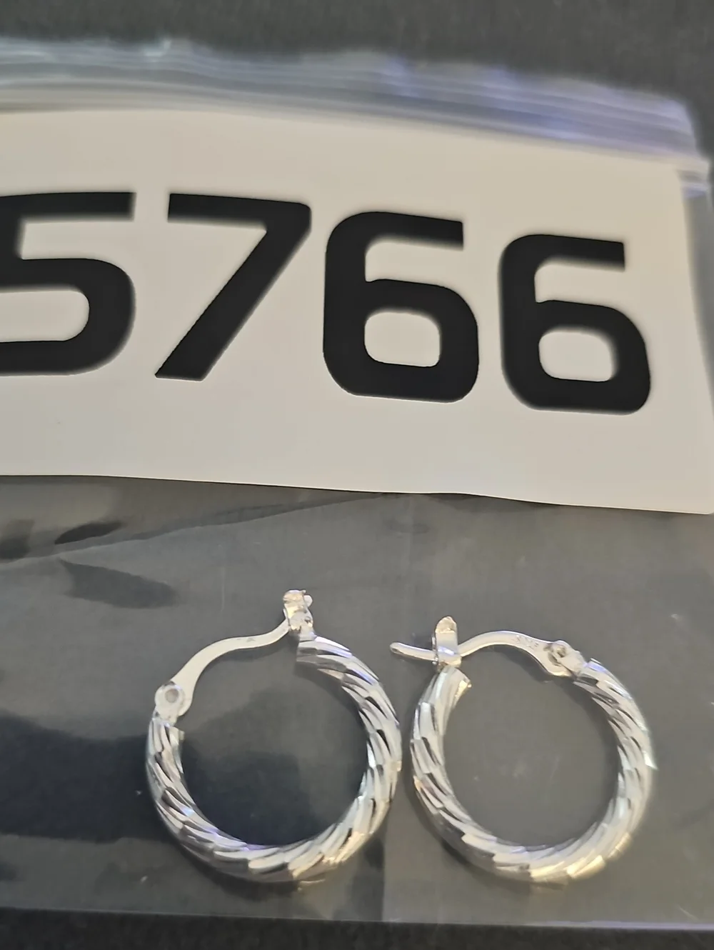 Elegant Silver Twisted Hoop Earrings. 925 Sterling